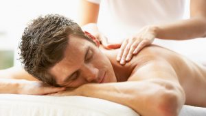 Man having a massage at a spa day